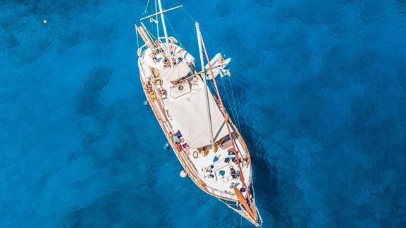 Sail crystal-clear waters near Rhodes on Alexia K. Perfect daily cruise for large groups.