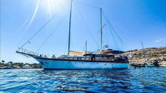 Discover hidden bays of Rhodes on a daily cruise with Alexia K gulet ideal for up to 40 guests.