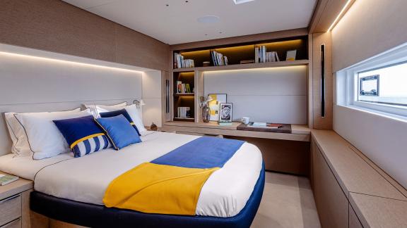 The luxurious cabin on the Catamaran Daiquiri features elegant design with a comfortable double bed, stylish lighting ac