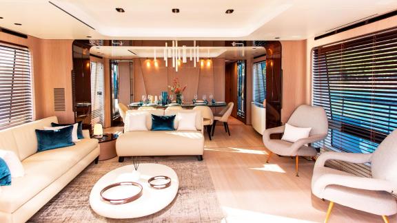 Elegant salon area of the 27-meter motor yacht Dawo in Sibenik, perfect for relaxing and dining.