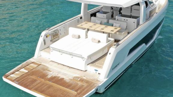 Among Nice daily yacht charter options, Coco is seen with a sunbathing and seating area on the aft deck.