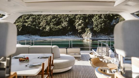 Relax in the elegant lounge of the Volante yacht with sea views.