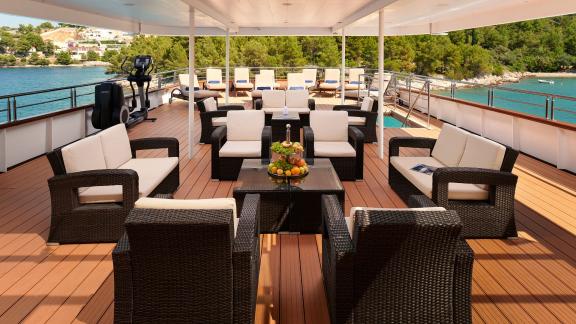 Luxurious seating area on the deck of the motor yacht Queen Eleganza in Croatia