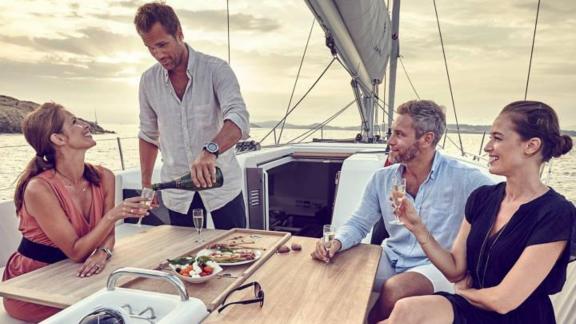 Guests enjoy snacks in the cockpit of sailing yacht Te Amo in Marmaris.