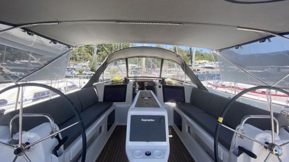 The cockpit of sailing yacht Desiree II is seen docked in the marina.