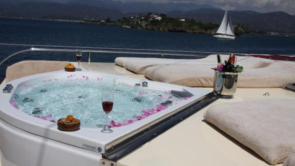 Luxurious whirlpool on the deck of the Diamond Lila, with a view of the Turkish Sea.