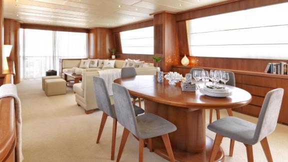 Elegant dining area of the 30-meter Motor Yacht Martina, perfect for stylish meals in Greece.