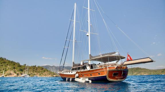 Gulet Diva Deniz with 6 cabins anchored in a bay near Marmaris.