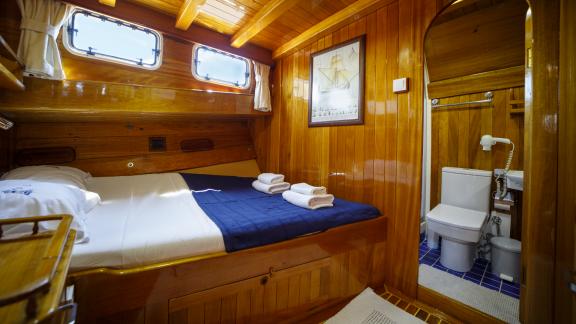 Enjoy the comfortable double cabin of Gulet Ya Selam with a private bathroom and stylish design.