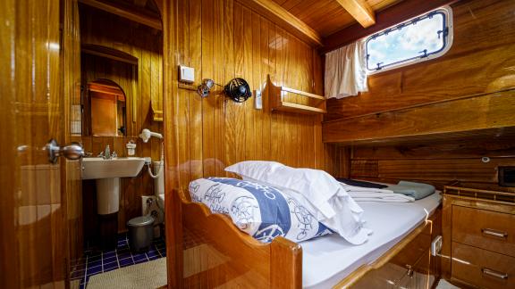 Experience comfort in the inviting single cabin of Gulet Ya Selam with a private bathroom.