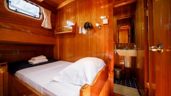 Enjoy your stay in the comfortable single cabin of Gulet Ya Selam with a private bathroom.