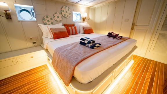 The cozy cabin of the Gulet Caustic in Bodrum, perfect for restful nights at sea.