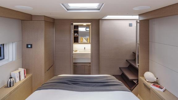 The elegant master cabin on the Catamaran Daiquiri offers luxurious comfort with a large bed, direct access to the bathr