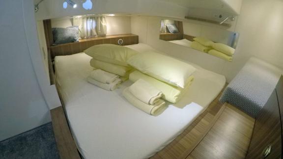 Comfortable and spacious bedroom on the motor yacht North Star.