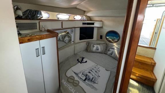 The stylish and cozy guest cabin of motor yacht Liberta provides a peaceful stay.