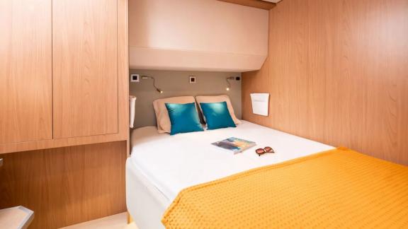 Comfortable and stylish cabin on the Sahana catamaran for a relaxing vacation.