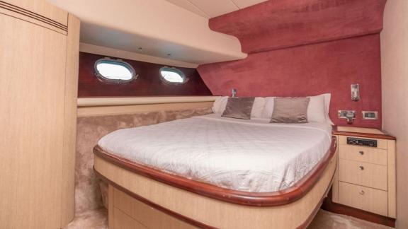 The double guest cabin of motor yacht Vintage offers comfort and elegant design.