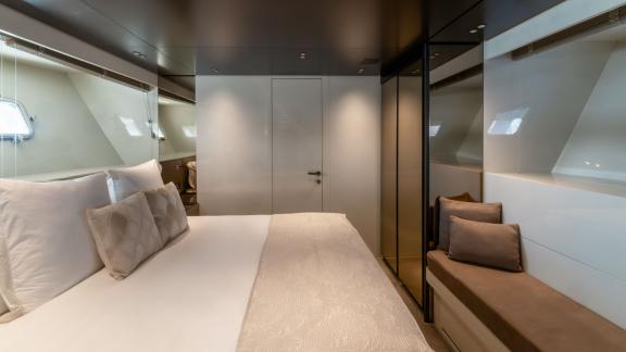 The guest cabin of San Lorenzo Sx88 offers a refined yet simple atmosphere for daily yacht rental in Dubai.