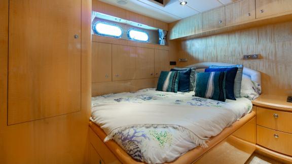 Bright and comfortable guest cabin on Ehthele yacht anchored off Mallorca coast.