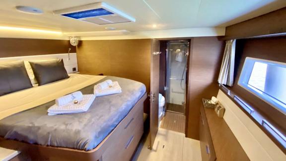 Grace Lagoon 620 catamaran offers a spacious cabin with private bathroom comfort.