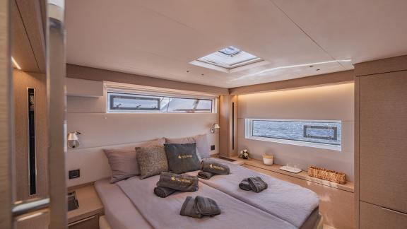 This cabin on TriWing Endor features panoramic sea views and soft lighting for a serene escape at sea.
