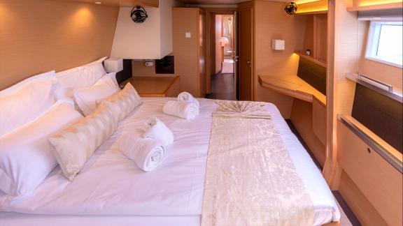 The guest cabin on Topaz Lagoon 560 catamaran features elegant design and spacious layout for added comfort.