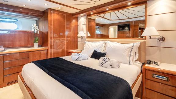 Available for charter in Athens the 4 cabin 10 guest Falcon 86 Estia Poseidon motor yacht features an elegant guest cabi