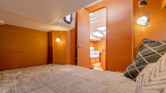 The cabin of Joy 5 offers a comfortable resting area, adding tranquility to your sea adventures.