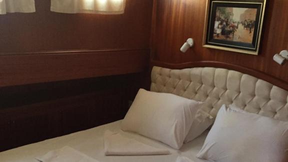 Comfortable double cabin on Gulet Cemre 4 offers a cozy sleeping area.