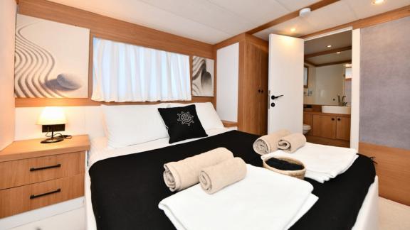 The elegant double cabin of Gulet Nayk 2 offers a luxurious retreat.