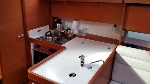 The modern kitchen of the yacht Friday offers comfortable meal preparation at sea.