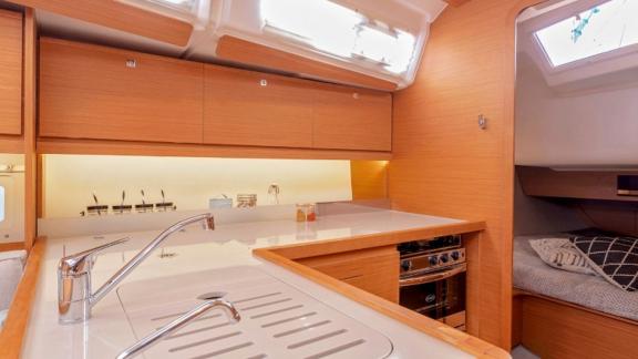 The kitchen of Joy 5 offers a comfortable experience with its stylish design and functional spaces.