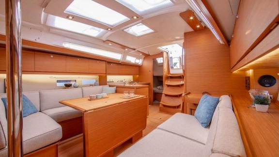 Modern and bright salon of Joy 5 sailboat with comfortable seating areas.