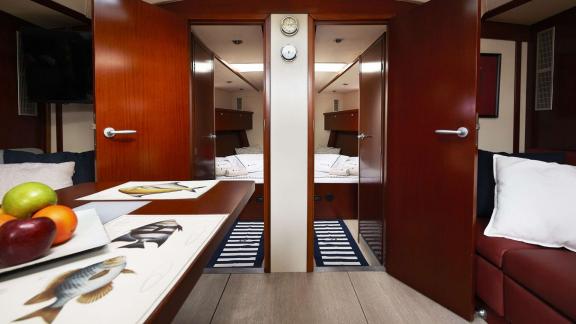 The cabin entrances on the Yannis 65S yacht stand out with their stylish design and modern interior.