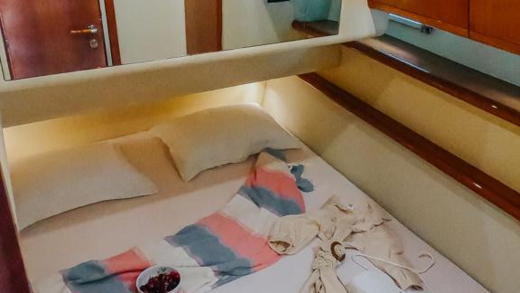 Secret features a double guest cabin for private motor yacht charters and comfortable yacht holidays in Mykonos.
