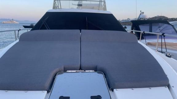 Secret features a spacious foredeck sunbathing area for private motor yacht charters and luxury summer escapes in Mykono
