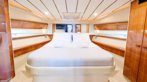 Secret features a spacious master cabin for luxury motor yacht charters and weekly yacht holidays in Mykonos.