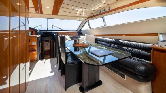 Simply Brilliant features a stylish interior dining area for private motor yacht charters and premium sea holidays.