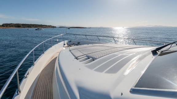 Simply Brilliant features a spacious foredeck for sunbathing and luxury motor yacht charters in Mykonos.