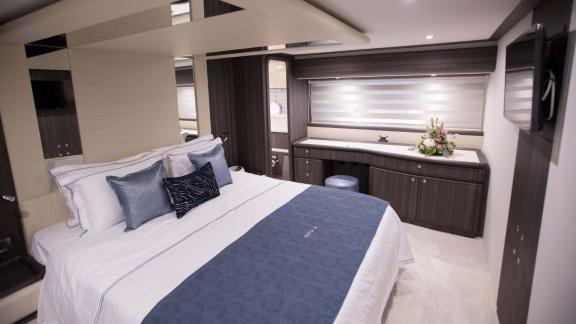 Among Athens yacht rental options Sofia D cabin shows double bed with modern interior and comfort.