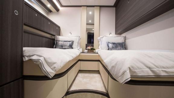 Among Athens yacht rental options Sofia D cabin shows twin separate beds with modern interior and comfort.