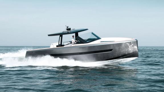 The Bombon motor yacht cruises swiftly across the open sea.