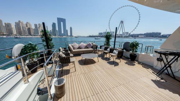 The deck of Tatii 2 offers a delightful experience with views of the iconic Ain Dubai.