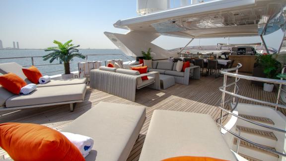 The upper deck of the Legende motor yacht offers unmatched comfort and elegance for yacht rental in Dubai.