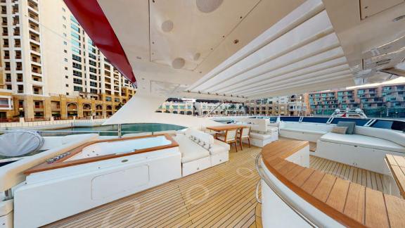 Tayget’s upper deck combines comfort and luxury for your Dubai yacht rental experience.