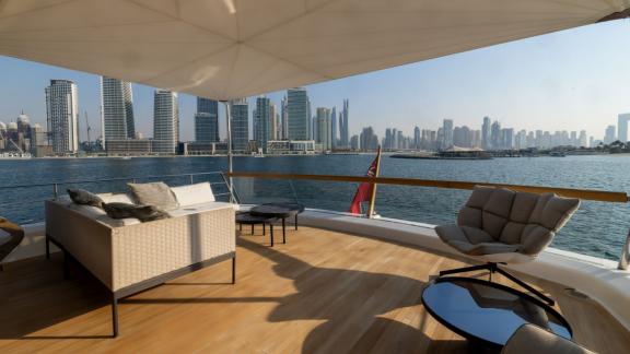 The aft deck of San Lorenzo Sx88 offers tranquility and luxury for a Dubai luxury yacht rental experience.