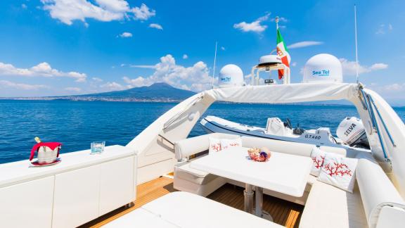 Experience comfort and elegance aboard the Riviera motor yacht in Naples.