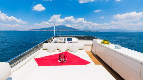 Enjoy luxury and comfort aboard the Riviera motor yacht in Naples.