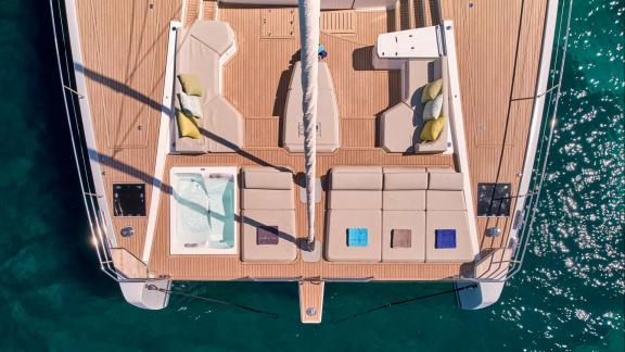Ad Astra features a jacuzzi and sunbeds on deck while anchored near Lavrion.