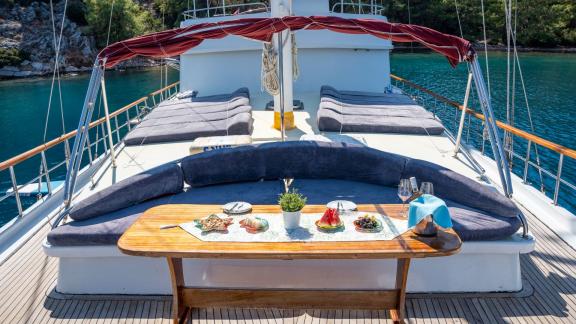 Enjoy a meal and relax on the comfortable loungers of Gulet S Nur 1 off the coast of Marmaris.